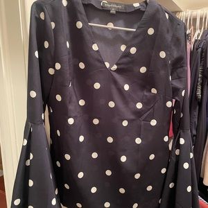 Too long for my arms. Never been worn.